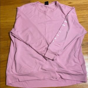 Pink Nike crew neck with pockets
